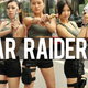 Illustration for article titled Chinese Lara Croft Lookalikes Handing Out Traffic Warnings in Hotpants
